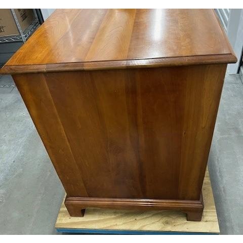 Mid 20th Century Stickley Cherry Valley Collection cherry Chippendale style desk with brass hardware and dovetail...
