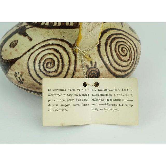 Italian ceramic vase from the 1970s. Manufacturer Vitali Ceramiche. Signed 'Vitali' on the bottom. According to the...