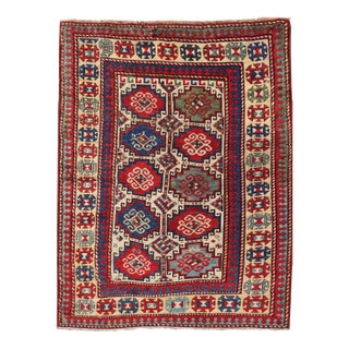 Antique Moghan Kazak Rug Showcasing Bold Geometric Medallions 4'6 X 6' For Sale