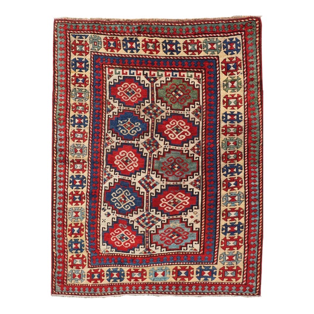Antique Moghan Kazak Rug Showcasing Bold Geometric Medallions 4'6 X 6' For Sale