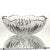 This American Brilliant Period cut glass bowl features a striking hobstar and saw tooth design, boasting an impressive...