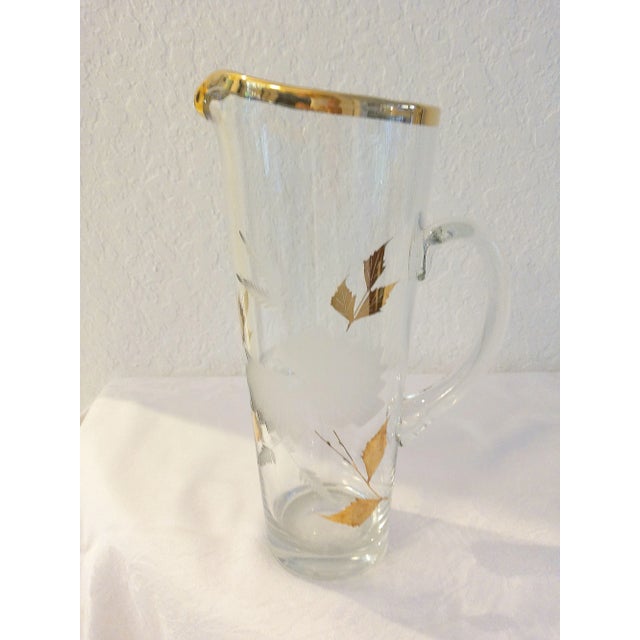 Lovely mid-century Czech crystal cocktail set includes one handled pitcher, (11"H x 7"L x 4.5"Dia), and four matching...