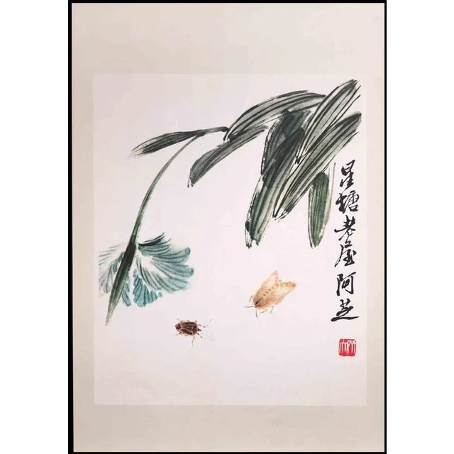 Flowers and bugs is a phototype print on paper realized in mid-20th Century by a Unknown Chinese Master. Monogrammed on...