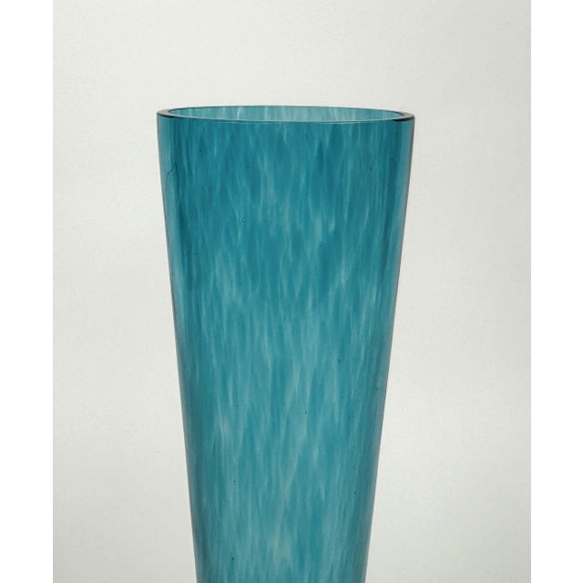 Delightful purple hobnail art glass vase with an aqua neck and yellow ring. Signed on the bottom. Vase opening: 2".