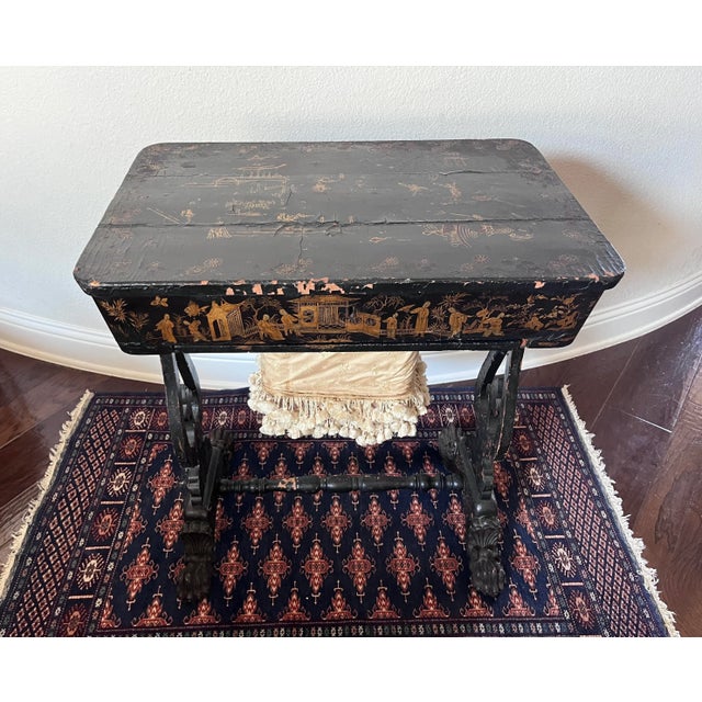 Antique 19th Century Chinese Export English Chinoiserie Black Laquered Sewing Table or Work Table The table is lavishly...