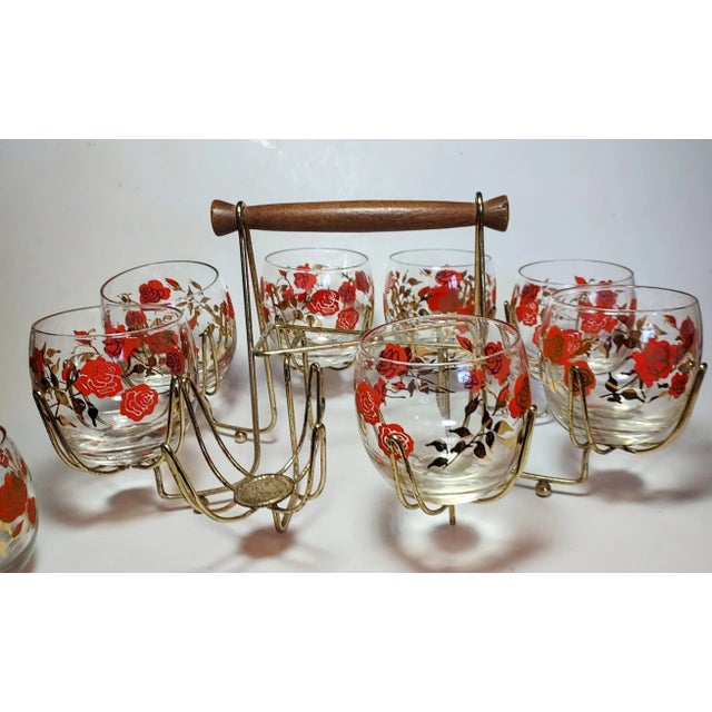 Welcome to the 1950s entertainment set! The roly pollies are decorated with vivid, red roses, in bud and bloom. The red...