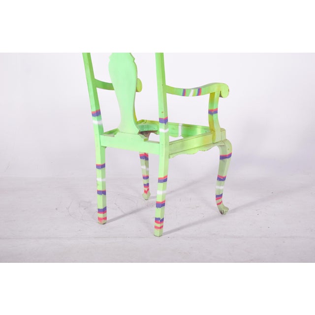 Painted armchair. Transformed by contemporary artistic intervention. The piece, inspired by classicism with a cut-out...