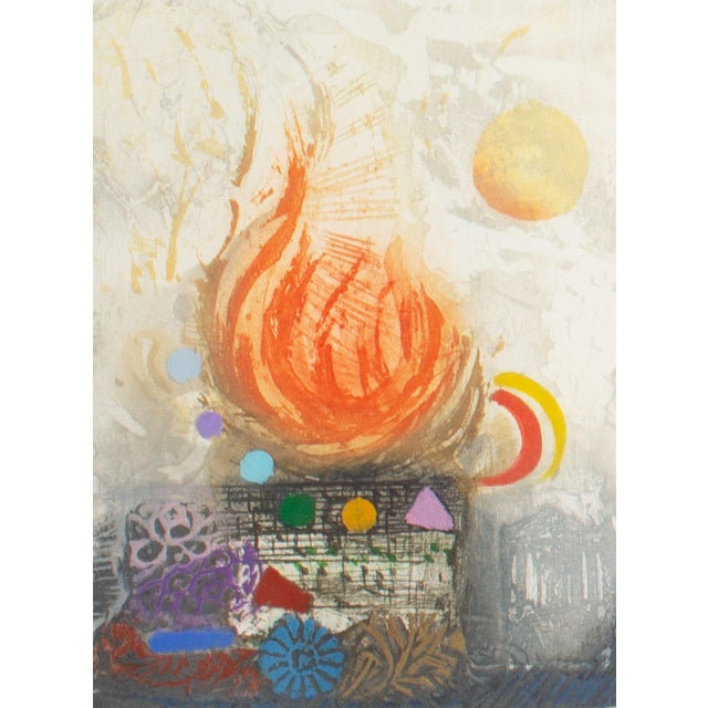 An etching by Israeli artist Nissan Engel (1931-2016). Titled "Été (Summer)," this abstract work depicts red flames at the...