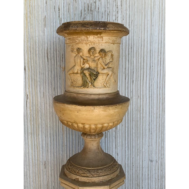 Monumental Italian neoclassical terracotta Campana-form garden urn . An extremely fine molded figural group of goddesses...