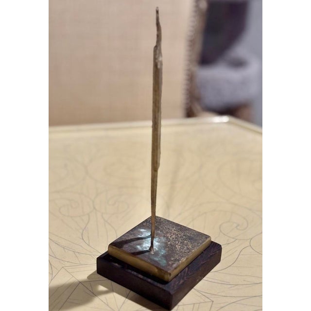 Pair of bronze abstract standing figures by artist Tom Bostelle (American, PA, 1821-2005). These two figures are from the...