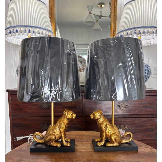 A fabulous pair of bookmatched cheetah lamps with gold foil-lined shades. Perfectly-sized for a buffet, console table,...