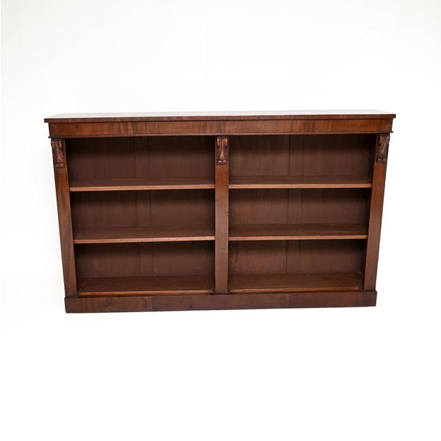 A large and impressive antique Victorian open bookcase. This was made in England, it originally dates from around the...