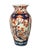 Japanese Imari Porcelain Vase. Vase features a flared rim, baluster-form body, and is hand-painted with flowering trees,...