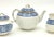 This five piece tea includes a creamer, sugar with lid, and pot with lid. The simple blue and white floral design is...
