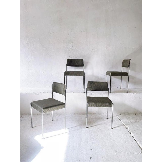 Set of four Swiss chairs designed by Martin Stoll from the 1970s. These chairs feature a robust chrome-plated metal frame...