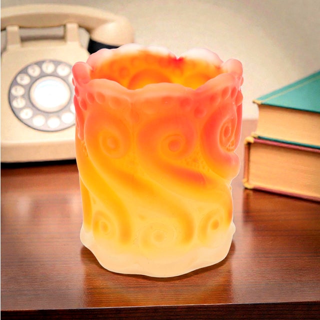 A finely molded early 20th-century pressed glass toothpick holder in the classic Scroll or “S-Scroll” pattern, attributed...