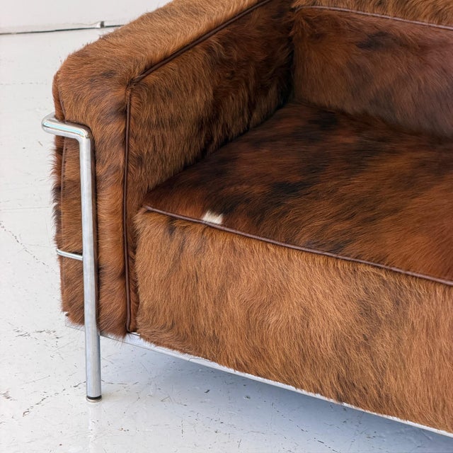 c. 1970s. Italy. Reupholstered in brown cowhide, all new foam.