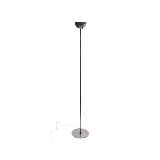A Sonneman style torchiere floor lamp. In the style of designer Robert Sonneman, this lamp features a dome-like shade, a...
