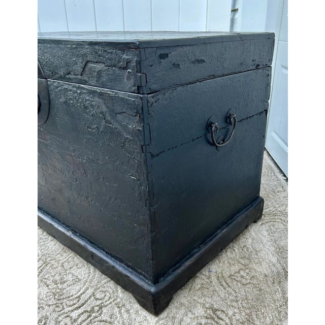 Antique (1900s) Trunk has an Asian Style. Black Lacquer Distressed Finish with a Muted Floral Design. The Measurements:...