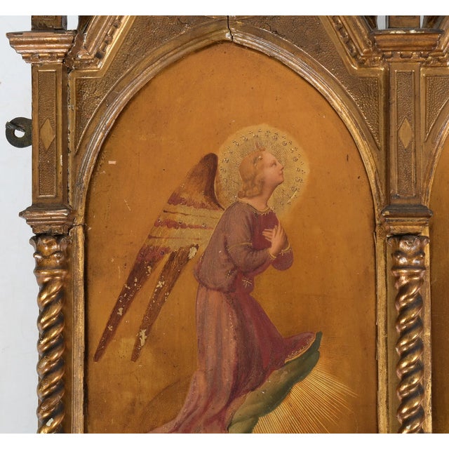 An exceptional Italian Gothic Revival devotional diptych featuring a pair of hand-painted kneeling angels inspired by the...
