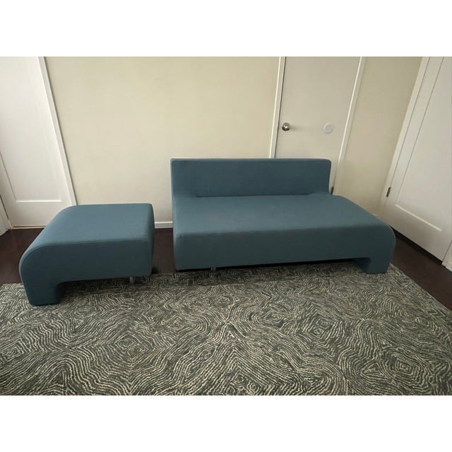 Blue sofa and single seat with chrome tubular legs. Manufactured by Hitch Myluis and design by Shin and Tomoko Azumi HM30...