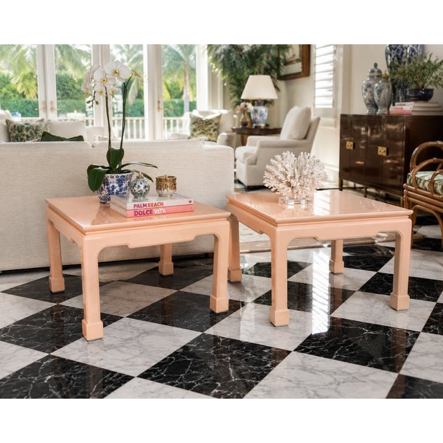 A striking pair of vintage Chinoiserie lacquer side tables in a beautiful peach blush finish. Inspired by classic Ming...