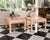 A striking pair of vintage Chinoiserie lacquer side tables in a beautiful peach blush finish. Inspired by classic Ming...