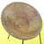 Comfortable wicker and metal armchair with a rounded structure.