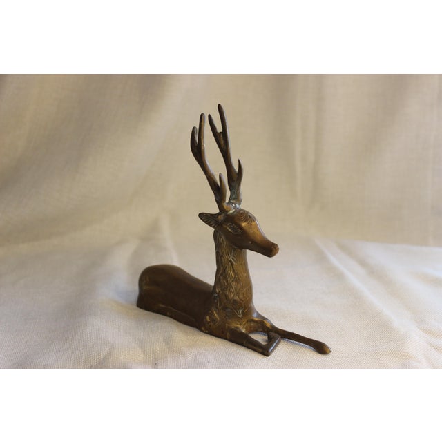 Vintage brass deer figurine with delicate mid century detailing, perfect for adding an elegant vintage touch to your...