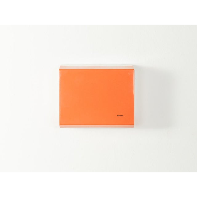 Krups mechanical kitchen scale from the 1970s with an orange plastic housing and a scale up to 3 kg. Original box and...