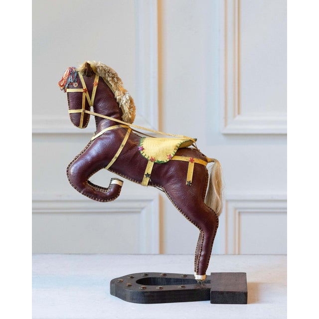 Charming and sculptural, this French decorative horse from the 20th century captures the elegance and vitality of...