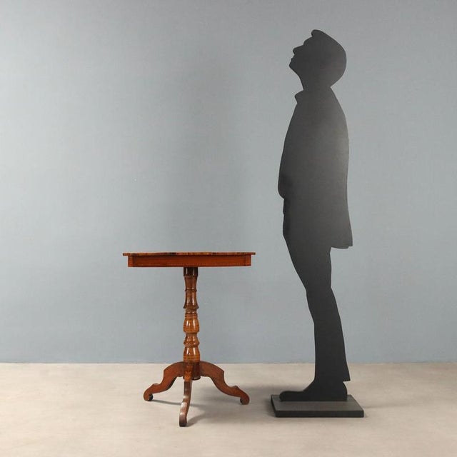 Inlaid table from Rolo craftsmanship dating back to the mid-19th century, featuring a chessboard pattern top. Made with...