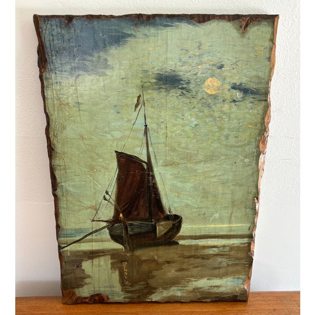 Moody and rustic wood-mounted nocturne print of a beached sailboat. Please see condition details noted. Most items found...
