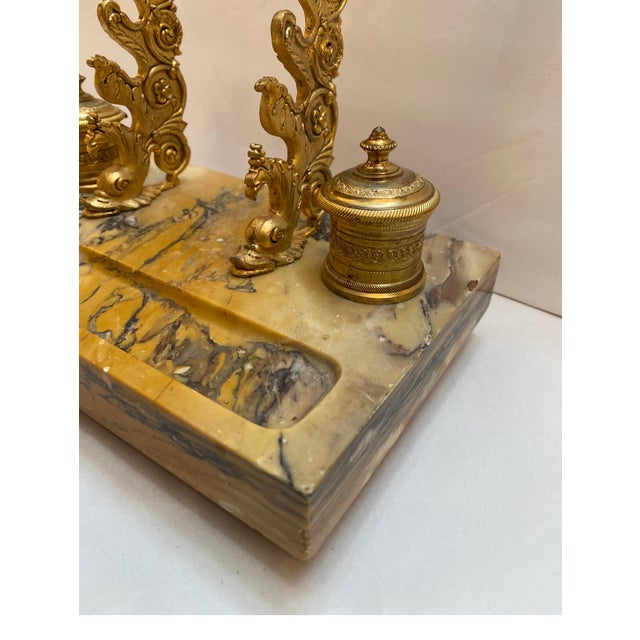 Elegant antique Siena marble and gilt bronze inkstand inkwell. The hand carved marble base with gilt bronze pen holder...