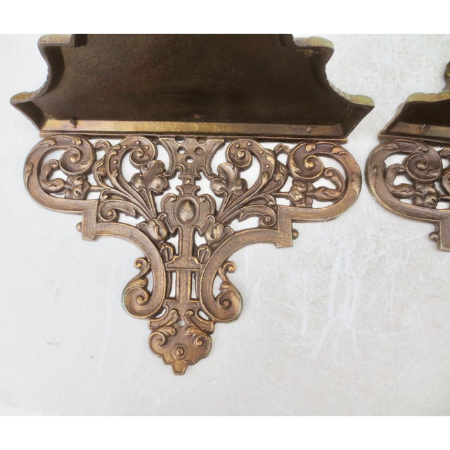 Elaborate and Decorative Metal Floral motifs with Gothic scrolling and griffins. Bronze finish over white metal casts....