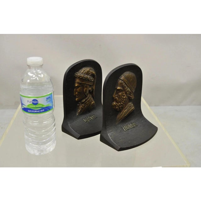 Vintage Bradley & Hubbard Cast Iron Dante and Homer Bookends - a Pair. Circa Early 20th Century. Measurements: 6.5" H x 6"...