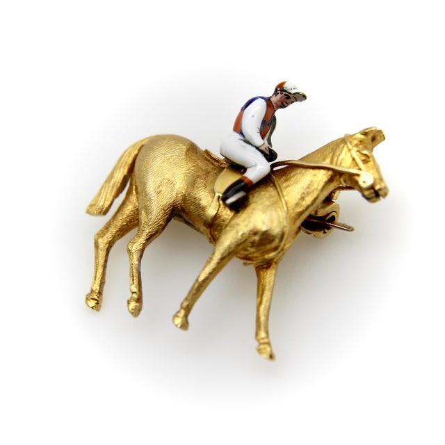 What we love most about this Edwardian 18k gold brooch is its attention to detail. The horse is rendered anatomically...