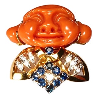 1960s 18K Yellow Gold Carved Red Coral Buddha Diamond Sapphire Pendant Pin For Sale