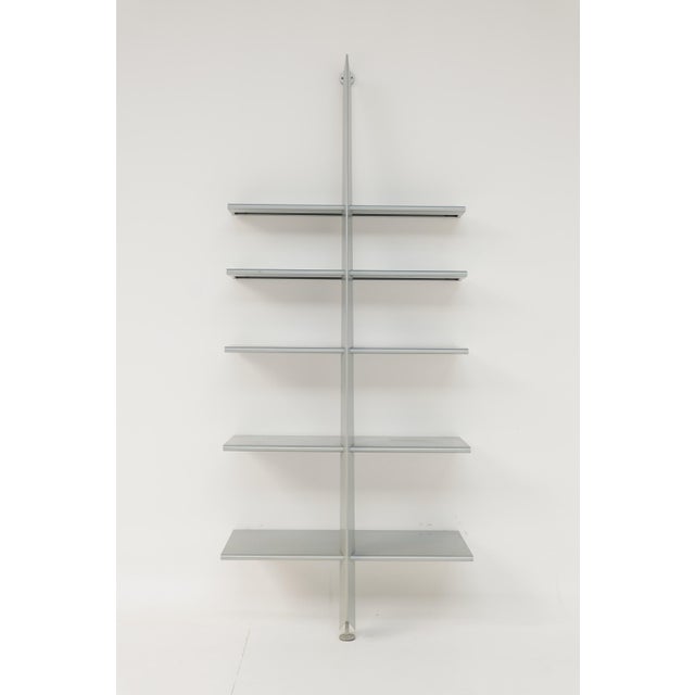 Mac Gee bookcase designed by Philippe Starck in 1984 and produced by Baleri Italia. Made of gray powder-coated steel, it...