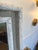This charming mirror is a simple way to expand any space. The double panels capture the trumeau essence while the white...