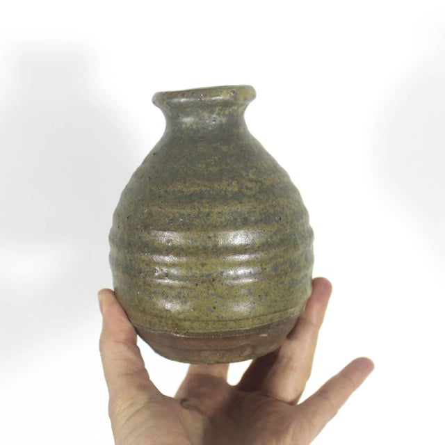 Width: 4 inches Height: 5 inches Stunning mid century modern handmade and signed stoneware vase. Rustic and natural. Very...