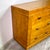 Super rare 11-drawer lowboy from the 80s. Half moon brass pulls and semi circle banding frame this well made piece. A...