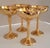 An exceptional set of four vintage champagne coupes by International Silver Company, beautifully rendered in a lustrous...