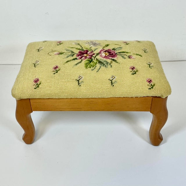 This little footstool is lovely. It’s from the 1960s and has been recovered with an Americana Folk Art Needlepoint...