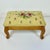 This little footstool is lovely. It’s from the 1960s and has been recovered with an Americana Folk Art Needlepoint...