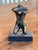 Small bronze female nude torso, simplified and smoothly modeled, with squared shoulders, a softly curved waist and hips,...