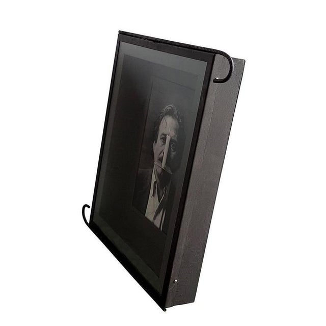 Original black and white photograph of the 1989 with the portrait of the famous artist. Hand signed in the lower center by...