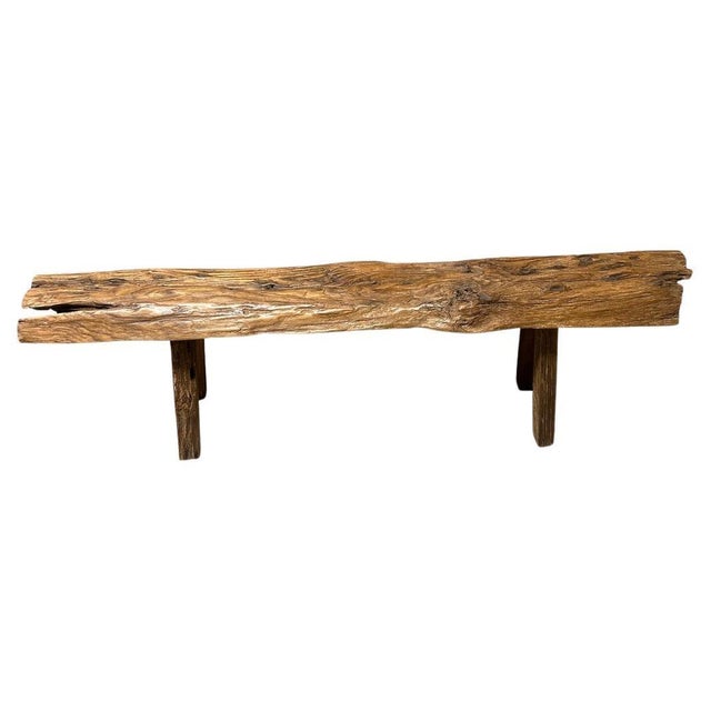 A single thick teak log with lovely patina is made into a beautiful bench with unique character. Both usable and...