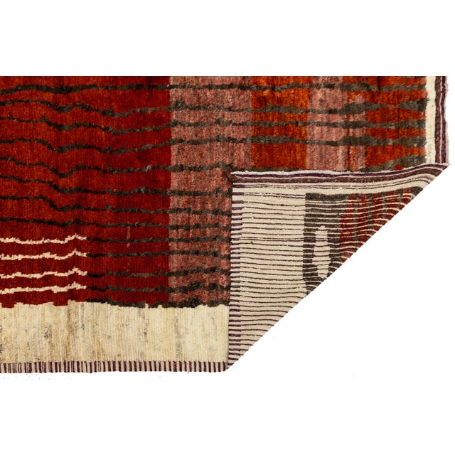 Enhance your space with this Modern Moroccan Style Wool Rug, featuring a bold interpretation of traditional Berber...