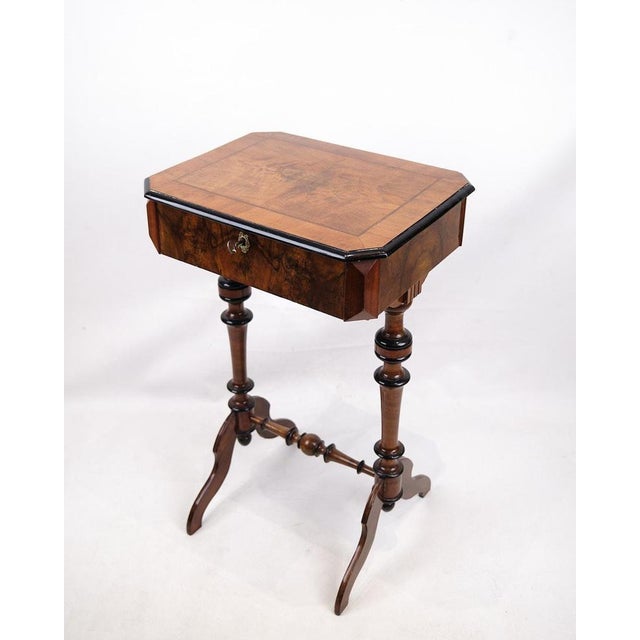 Antique sewing/side table in hand-polished mahogany from the 1890s. with built-in storage and turned legs. — Period: 1890s...